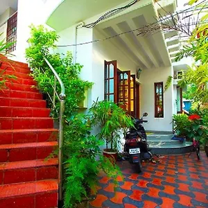 Couette-café Christville, Kochi
